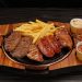 A revolução do churrasco na pedra: Billy The Grill aposta em nova experiência, cortes em bife e pratos compartilháveis